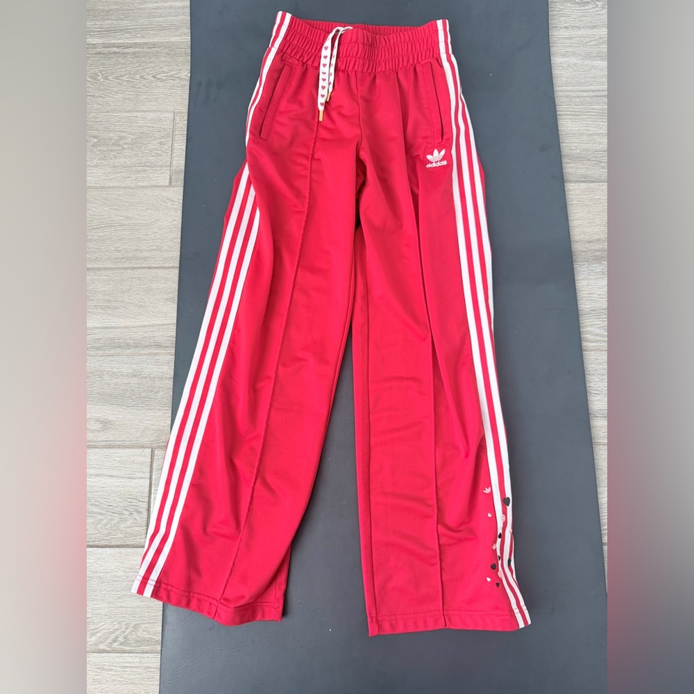 Adidas Red pants with White Stripes